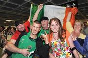 13 September 2009; Boxer John Joe Nevin celebrates with his, family from left to right, uncle Jacko, father Murphy, mother Winnie and his wife Marie on his return to Dublin Airport after winning the Bronze Medal at the 2009 AIBA World Boxing Championships Final in Assago, Milan, Italy. Picture credit: David Maher / SPORTSFILE