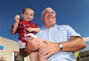 13 September 2009; The recently appointed Galway football manager Joe Kernan with 4 year old Eanna Monahan, from Claregalway, before the game. Galway Senior Football Championship Semi-Final, Mountbellew/Moylough v Caltra, Tuam, Co Galway. Photo by Sportsfile