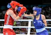 24 June 2015; Katie Taylor, Ireland, right, exchanges punches with Ida Lundblad, Sweden, during their Women's Boxing Light 60kg Quarter Final bout. 2015 European Games, Crystal Hall, Baku, Azerbaijan Picture credit: Stephen McCarthy / SPORTSFILE