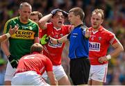 5 July 2015; Cork's Mark Collins, 3rd from right, reacts as referee Padraig Hughes awards a penalty to Kerry. Munster GAA Football Senior Championship Final, Kerry v Cork. Fitzgerald Stadium, Killarney, Co. Kerry. Picture credit: Brendan Moran / SPORTSFILE