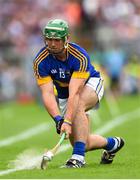 12 July 2015; John O’Dwyer, Tipperary, takes a sideline cut. Munster GAA Hurling Senior Championship Final, Tipperary v Waterford. Semple Stadium, Thurles, Co. Tipperary. Picture credit: Stephen McCarthy / SPORTSFILE