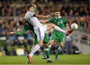 16 November 2015; Edin Džeko, Bosnia and Herzegovina, in action against Richard Keogh, Republic of Ireland. UEFA EURO 2016 Championship Qualifier, Play-off, 2nd Leg, Republic of Ireland v Bosnia and Herzegovina. Aviva Stadium, Lansdowne Road, Dublin. Photo by Sportsfile