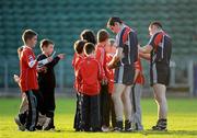 9 September 2009; Cork captain Graham Canty and team-mate Noel O'Leary sign autographs for young supporters after a squad training ahead of their GAA Football All-Ireland Senior Championship Final game against Kerry on September the 20th. Pairc Ui Chaoimh, Cork. Picture credit: Brendan Moran / SPORTSFILE