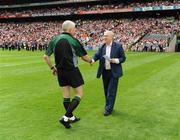 23 August 2009; Frank Murphy, Cork County Board Secretary, shakes hands with referee John Bannon before the game. GAA Football All-Ireland Senior Championship Semi-Final, Tyrone v Cork, Croke Park, Dublin. Picture credit: Ray McManus / SPORTSFILE