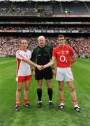 23 August 2009; Tyrone captain Brian Dooher and Cork captain Graham Canty shake hands in front of Referee John Bannon before the game. GAA Football All-Ireland Senior Championship Semi-Final, Tyrone v Cork, Croke Park, Dublin. Picture credit: Ray McManus / SPORTSFILE