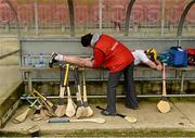 15 March 2015; Conor Grogan, Tyrone, getting a prematch rub down from Tyrone team physiotherapist Frances Devlin in the team dug out. Allianz Hurling League, Division 3A, Round 4, Tyrone v Louth, Healy Park, Omagh, Co. Tyrone. Picture credit: Oliver McVeigh / SPORTSFILE