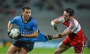 28 March 2015; Cormac Costello, Dublin, in action against Oisin Duffy, Derry. Allianz Football League, Division 1, Round 6, Dublin v Derry. Croke Park, Dublin. Picture credit: Ray McManus / SPORTSFILE