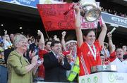 13 September 2009; Cork captain Amanda O'Regan lifts the O'Duffy Cup in the presence of Joan O'Flynn, President of the Camogie Association, Gary Dempsey, CEO of Gala, Sinead O'Connor, Ard Stuirthoir of the Camogie association, and An Taoiseach Brian Cowen T.D. at the Gala All-Ireland Camogie Championship Finals. Croke Park, Dublin. Picture credit: Pat Murphy / SPORTSFILE