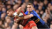 19 December 2015; Sebastien Tillous-Borde, Toulon, is tackled by Nick McCarthy, Leinster. European Rugby Champions Cup, Pool 5, Round 4, Leinster v RC Toulon. Aviva Stadium, Lansdowne Road, Dublin. Picture credit: Stephen McCarthy / SPORTSFILE