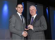 18 December 2015; Dublin captain Stephen Cluxton is presented with his All Ireland medal by Uachtarán Chumann Lúthchleas Aogán Ó Fearghail at the presentation of O'Byrne Cup, Allianz League, Leinster and All Ireland Championship medals at Croke Park, Dublin. Picture credit: Ray McManus / SPORTSFILE