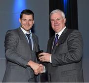 18 December 2015; Dublin's Kevin McManamon is presented with his All Ireland medal by Uachtarán Chumann Lúthchleas Aogán Ó Fearghail at the presentation of O'Byrne Cup. Allianz League, Leinster and All Irelaand Championship medals at Croke Park, Dublin. Picture credit: Ray McManus / SPORTSFILE