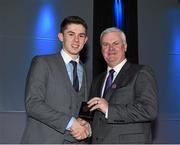 18 December 2015; Dublin's  David Byrne is presented with his All Ireland medal by Uachtarán Chumann Lúthchleas Aogán Ó Fearghail at the presentation of O'Byrne Cup, Allianz League, Leinster and All Ireland Championship medals at Croke Park, Dublin. Picture credit: Ray McManus / SPORTSFILE