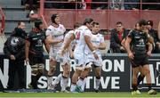 20 December ptember 2015; Andrew Trimble, Ulster, hidden, celebrates with team-mates Franco Van Der Merwe, Nick Williams and Louis Ludik after scoring his side's second try. European Rugby Champions Cup, Pool 1, Round 4, Toulouse v Ulster. Stade Ernest Wallon, Toulouse, France.. Picture credit: Oliver McVeigh / SPORTSFILE