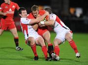 18 September 2009; Mark Robertson, Edinburgh, in action against Ian Whitten and Darren Cave, Ulster. Celtic League, Ulster v Edinburgh, Ravenhill, Belfast, Co. Antrim. Picture credit: Oliver McVeigh / SPORTSFILE