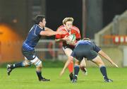 18 September 2009; Darren Moloney, Munster, is tackled by Robin O'Sullivan, left, and Brian Kingston, Leinster. U20 Interprovincial, Munster v Leinster, Thomond Park, Limerick. Picture credit: Diarmuid Greene / SPORTSFILE