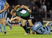 18 September 2009; Fionn Carr, Connacht, is tackled by Sam Warburton, 7, and Paul Tito, Cardiff Blues. Celtic League, Connacht v Cardiff Blues, Sportsground, Galway. Picture credit: Matt Browne / SPORTSFILE