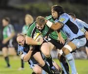 18 September 2009; Sean Cronin, Connacht, is tackled by Gareth Williams and Ma'ama Molitika, Cardiff Blues. Celtic League, Connacht v Cardiff Blues, Sportsground, Galway. Picture credit: Matt Browne / SPORTSFILE