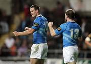 18 September 2009; Leinster's Jonathan Sexton and Gordon D'Arcy celebrate victory at the final whistle. Celtic League, Neath Swansea Ospreys v Leinster, Liberty Stadium, Swansea, Wales. Picture credit: Steve Pope / SPORTSFILE