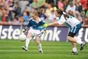 30 August 2009; Aisling Meaney, Barefield N.S., Co. Clare, in action against Ciara Burke, Ballylinan N.S., Co. Laois. Go Games during half time in the Kerry v Meath game. Croke Park, Dublin. Picture credit: Pat Murphy / SPORTSFILE