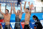 2 August 2009; Members of the US team, from left, Aaron Peirsol, Eric Shanteau, and Michael Phelps celebrate after the men's 4x100m medley final. The USA won in a World Record time of 3:27.28. FINA World Swimming Championships Rome 2009, Foro Italico, Rome, Italy. Picture credit: Brian Lawless / SPORTSFILE