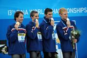 2 August 2009; The USA Men's 4 x 100m Medley Relay team, from left, Aaron Peirsol, Eric Shanteau, Michael Phelps and David Walters, on the podium after receiving their Gold medals. The USA won in a World Record time of 3:27.28. FINA World Swimming Championships Rome 2009, Foro Italico, Rome, Italy. Picture credit: Brian Lawless / SPORTSFILE