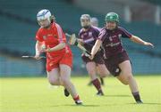 19 September 2009; Eimear Watson, Cork, in action against Nicola Lawless, Galway. Gala All-Ireland Intermediate Camogie Final, Cork v Galway, Gaelic Grounds, Limerick. Picture credit: Diarmuid Greene / SPORTSFILE