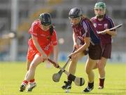 19 September 2009; Liz Power, Cork, in action against Aoife Lynskey, Galway. Gala All-Ireland Intermediate Camogie Final, Cork v Galway, Gaelic Grounds, Limerick. Picture credit: Diarmuid Greene / SPORTSFILE