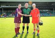 19 September 2009; Referee Alan Lagrue with Galway captain Caroline Kelly and Cork captain Ann Marie Fleming. Gala All-Ireland Intermediate Camogie Final, Cork v Galway, Gaelic Grounds, Limerick. Picture credit: Diarmuid Greene / SPORTSFILE