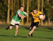 19 September 2009; Aidan Cassidy, Augher St. Macartans, Tyrone, in action against David Cattigan, Achill. Bord Gáis Energy St. Jude’s All-Ireland Junior Football Sevens Cup Final 2009. St. Jude's GAA Club, Templeogue, Dublin. Photo by Sportsfile