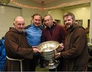 21 December 2015; Dublin manager Jim Gavin with Br. Kevin Crowley, Fr Robert McCabe, CC, Navan, and Fr Bryan Shorthall as they help pack some 3,000 Christmas parcels for the homeless at the Capuchin Day Centre on Bow Street, Dublin. Picture credit: Ray McManus / SPORTSFILE