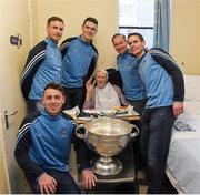25 December 2015; Dublin footballers Brian Fenton, Eoin Culligan, Cormac Costello, captain Stephen Cluxton and manager Jim Gavin with John O'SullEvan, from Artane, Dublin, who celebrated his 91st birthday on Christmas Eve, when they and the Sam Maguire visited patients of Beaumount Hospital on Christmas Day. Beaumont Hospital, Beaumont Rd, Dublin.  Picture credit: Ray McManus / SPORTSFILE