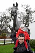 26 December 2015; Trevor Platt with his daughter Amelia, 18 months old, with the statue of Snowfairy at the races. Leopardstown Christmas Racing Festival, Leopardstown Racecourse, Dublin. Picture credit: Cody Glenn / SPORTSFILE
