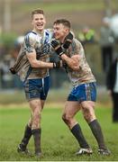26 December 2015; St Mary's players Aidan Walsh, left, and Denis Daly celebrate their side's victory at the final whistle. South Kerry Senior Football Championship Final, St Mary's v Waterville. Páirc Chill Imeallach, Portmagee, Co. Kerry. Picture credit: Stephen McCarthy / SPORTSFILE