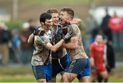 26 December 2015; St Mary's players, from left, Sean Cournane, Aidan Walsh and Denis Daly celebrate their side's victory at the final whistle. South Kerry Senior Football Championship Final, St Mary's v Waterville. Páirc Chill Imeallach, Portmagee, Co. Kerry. Picture credit: Stephen McCarthy / SPORTSFILE