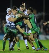 26 December 2015; Tiernan O'Halloran, Connacht, is tackled by Luke Marshall and Stuart McCloskey, Ulster. Guinness PRO12 Round 10, Connacht v Ulster, Sportsground, Galway. Picture credit: David Maher / SPORTSFILE