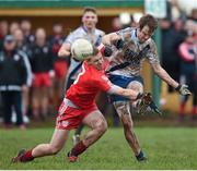 26 December 2015; Niall O'Driscoll, St Mary's, in action against Daniel O'Dwyer, Waterville. South Kerry Senior Football Championship Final, St Mary's v Waterville. Páirc Chill Imeallach, Portmagee, Co. Kerry. Picture credit: Stephen McCarthy / SPORTSFILE