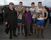 26 December 2015; St Mary's players, from left, Denis Daly, Paul O'Donoghue and Daniel Daly with their grandmother Mary Daly and Bart Moriarty following their victory. South Kerry Senior Football Championship Final, St Mary's v Waterville. Páirc Chill Imeallach, Portmagee, Co. Kerry. Picture credit: Stephen McCarthy / SPORTSFILE
