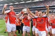 20 September 2009; Armagh players Peter Carragher, left, Ronan Finnegan, centre, and Robbie Tasker, celebrate with the Tom Markham Cup after the game. ESB GAA Football All-Ireland Minor Championship Final, Armagh v Mayo, Croke Park, Dublin. Picture credit: Pat Murphy / SPORTSFILE