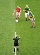 20 September 2009; Referee Marty Duffy trows in the ball at the start of the game. GAA Football All-Ireland Senior Championship Final, Kerry v Cork, Croke Park, Dublin. Picture credit: Ray McManus / SPORTSFILE