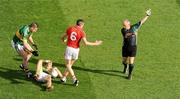 20 September 2009; Darragh O Se runs to collect the ball from his Kerry team-mate Tadhg Kennelly as referee Marty Duffy indicates a free to Cork captain Graham Canty. GAA Football All-Ireland Senior Championship Final, Kerry v Cork, Croke Park, Dublin. Picture credit: Ray McManus / SPORTSFILE