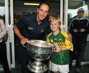 21 September 2009; Kerry's Tadhg Kennelly with Darragh O'Brien, from Clonsilla, Dublin, and the Sam Maguire Cup during a visit to Our Lady's Hospital for Sick Chidren in Crumlin. Crumlin, Co. Dublin. Picture credit: Pat Murphy / SPORTSFILE