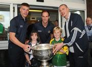 21 September 2009; Kerry's Tommy Walsh, Tadhg Kennelly and Kieran Donaghy with Chloe McGlue and Darragh O'Brien, from Clonsilla, Dublin, and the Sam Maguire Cup during a visit to Our Lady's Hospital for Sick Chidren in Crumlin. Crumlin, Co. Dublin. Picture credit: Pat Murphy / SPORTSFILE