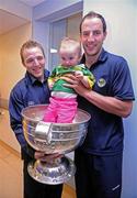 21 September 2009; Kerry's Darran O'Sullivan and Tadhg Kennelly with fourteen month old Eabha Fitzpatrick and the Sam Maguire Cup during a visit to Our Lady's Hospital for Sick Chidren in Crumlin. Crumlin, Co. Dublin. Picture credit: Pat Murphy / SPORTSFILE