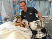 21 September 2009; Kerry's Tadhg Kennelly with his cousin Vincent McVeigh and the Sam Maguire Cup during a visit to Our Lady's Hospital for Sick Chidren in Crumlin. Crumlin, Co. Dublin. Picture credit: Pat Murphy / SPORTSFILE