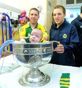 21 September 2009; Kerry's Darran O'Sullivan with Ella O'Connor, her father Daniel and the Sam Maguire Cup during a visit to Our Lady's Hospital for Sick Chidren in Crumlin. Crumlin, Co. Dublin. Picture credit: Pat Murphy / SPORTSFILE