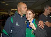 21  September 2009; European Lightweight Champion Katie Taylor with her father Peter upon return home to Dublin Airport after claiming her 4th European title on the trot. Dublin Airport, Dublin. Picture credit: John Barrington / SPORTSFILE