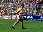 18 June 2000; Liam Dunne of Wexford leaves the field after being sent off by referee Willie Barrett during the Guinness Leinster Senior Hurling Championship Semi-Final match between Offaly and Wexford at Croke Park in Dublin. Photo by Aoife Rice/Sportsfile