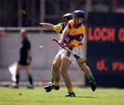 18 June 2000; Liam Dunne of Wexford in action against Brendan Murphy of Offaly during the Guinness Leinster Senior Hurling Championship Semi-Final match between Offaly and Wexford at Croke Park in Dublin. Photo by Ray McManus/Sportsfile