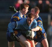 21 January 2001; Kenneth Darcy of Dublin is tackled by Thomas Burke, left and Gary Doran of Wicklow during the O'Byrne Cup Quarter-Final match between Wicklow and Dublin at the County Grounds in Aughrim, Wicklow. Photo by David Maher/Sportsfile