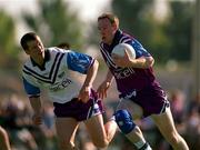 26 January 2001; Philip Clifford of the 1999 Eircell All Stars in action against Gary Fahey of the 2000 Eircell All Stars during the Eircell GAA All Stars Exibition game at Dubai Rugby Ground in Dubai, United Arab Emirates. Photo by Ray McManus/Sportsfile